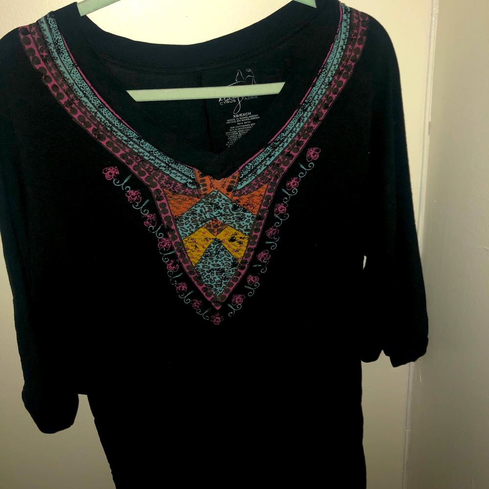 Black shirt with design along the neckline